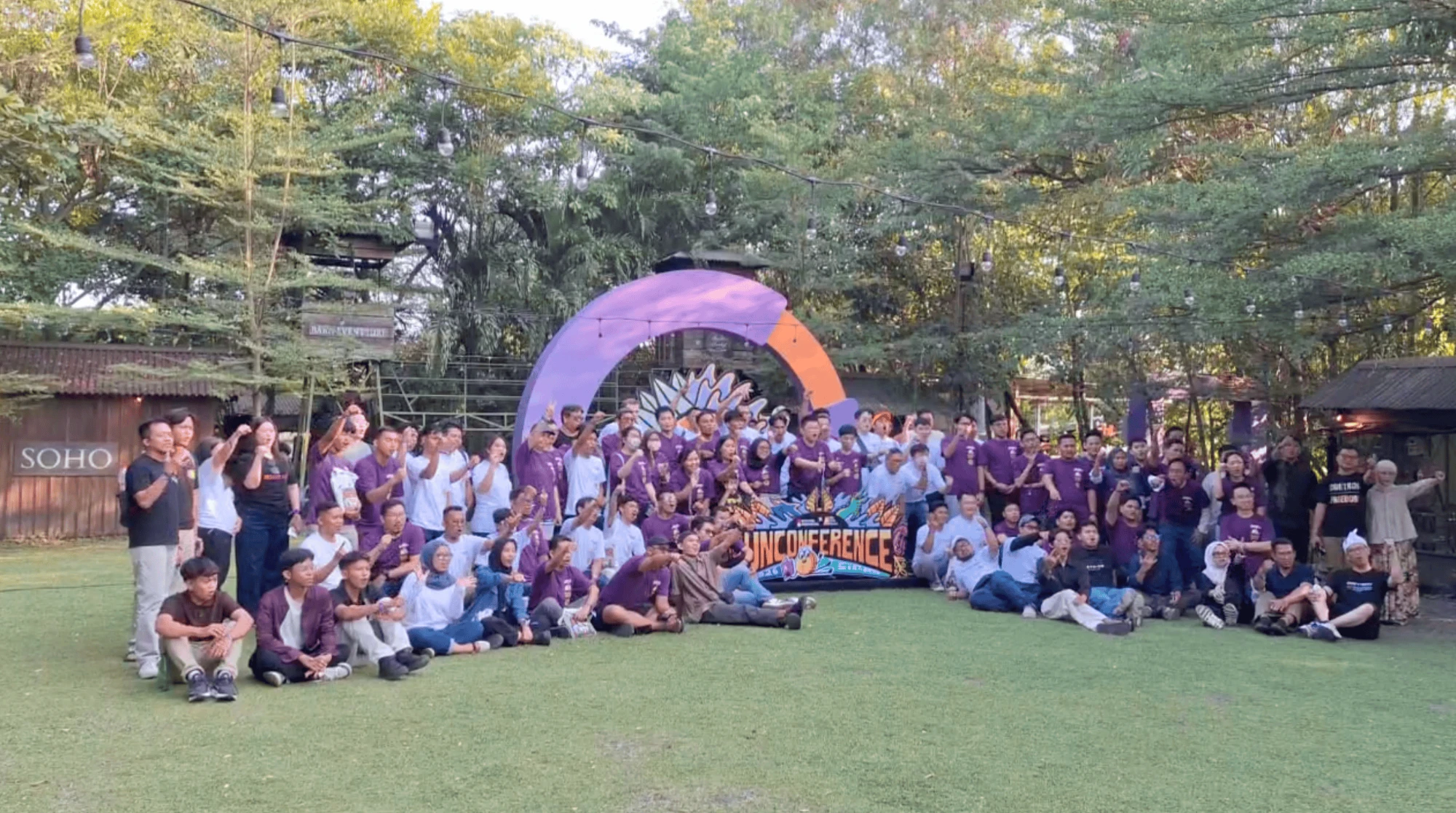 Around 200 participants of the My First Bitcoin Unconference 2026 gathered on the lawn in front of the Unconference arch in Surabaya