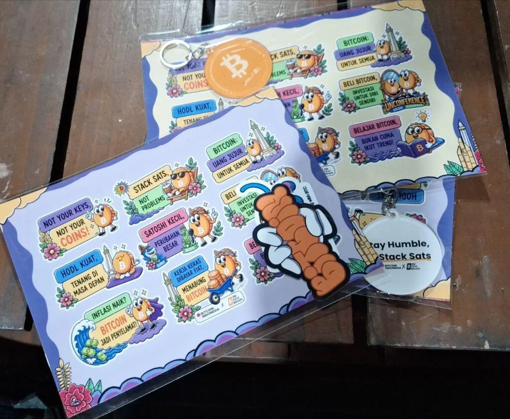 My First Bitcoin 19 Bitcoin sticker sheets and keychains handed out to participants at the MFB Unconference 2026 in Surabaya